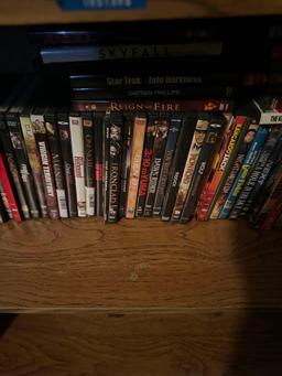 Shelf with contents DVDs & VHS tapes 28 in x 72 in (upstairs)