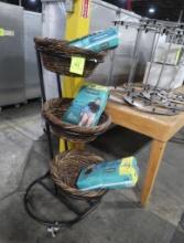 3-tiered basket stand w/ baskets & Depends, on casters