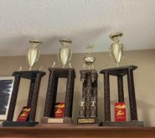 lot of 4 corvette trophies from the suburban corvette club. 31x10