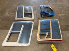 STACKS OF USED BELL 206 WEDGE WINDOWS & SIDE WINDOWS