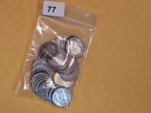 Twenty-seven mixed silver dimes