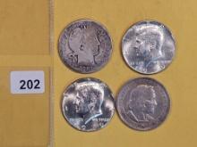 Four mixed silver Half Dollars