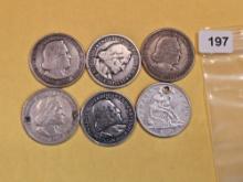 Six silver half dollars