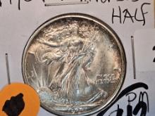 Choice Brilliant uncirculated plus 1944-D Walking Liberty Half Dollar