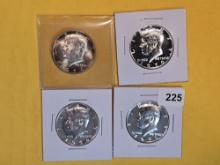 Four mixed silver Kennedy Half Dollars