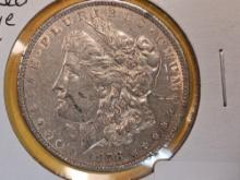 1878 7/4 Tailfeathers Morgan Dollar in About Uncirculated - details