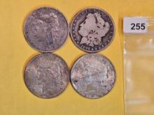 Four mixed silver Dollars