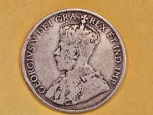 1919 Newfoundland silver 50 cents in Very Good plus