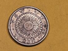 1897 Japan silver 10 sen in Bright About Uncirculated