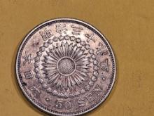 1906 Japan silver 50 sen in About Uncirculated