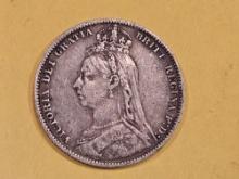 1890 Great Britain silver shilling in Very Fine