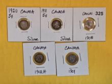 Five silver Canada 5 cent coins