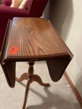 Drop leaf table 25 inches tall 16 inches wide 10 inches wide with leaves dropped 2 foot wide with