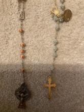 Catholic rosaries with little pocket purse for them