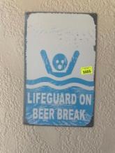 Lifeguard on beer break sign metal