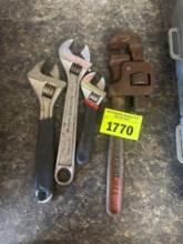 three small crescent and small pipe wrench