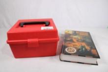 One 100 cnt case-gard ammo box and one Speer hardback reloading manual.