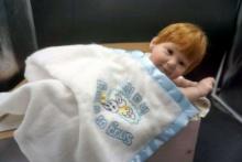 Baby W/ Snug As A Bug In A Rug Blanket