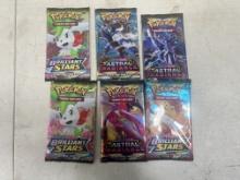 6- unopened packs of Asst. Pokemon