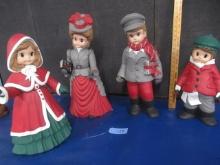 SET OF 4 CERAMIC CAROLERS - ONE IS MISSING SOMETHING ON HAND-  SEE PIC