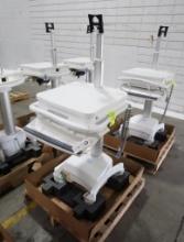 Enovate medical grade adjustable height work stations, new, on casters