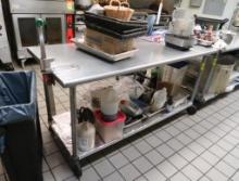 stainless table w/ undershelf, on casters, w/ can opener