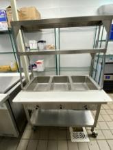44â€� stainless steel three-hole steam table with over shelf and mounted on casters