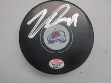 Nathan MacKinnon of the Colorado Avalanche signed autographed hockey puck PAAS COA 402