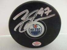 Connor McDavid of the Edmonton Oilers signed autographed hockey puck PAAS COA 414