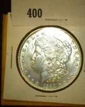 1890 P Morgan Silver Dollar, AU.