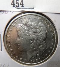 1884 P Morgan Silver Dollar, Fine.