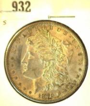 1879 S Morgan Silver Dollar, EF+ with natural toning.