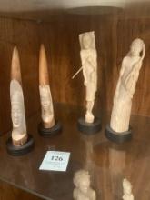 GROUP OF FOUR CARVED FIGURES FROM ANTLER