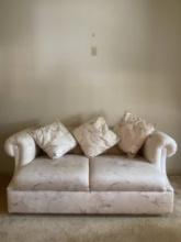 TWO SEAT UPHOLSTERED SETTEE