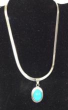 STERLING SILVER CHAIN & PENDENT WITH BLUE STONE