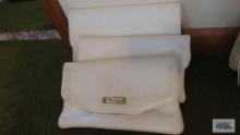Lot of white clutch bags