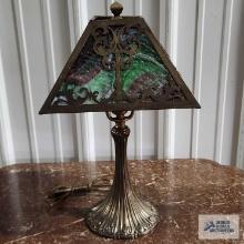 Antique slag glass lamp with metal base. 17 in. tall, base of glass is 10 in. wide