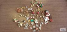 Variety of holiday pins and earrings