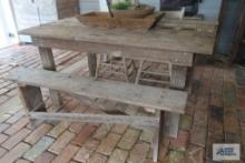 Wooden table with bench and two chairs