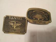 Two Brass "Daniel Construction Company" Advertisement Belt Buckles
