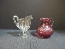 Footed Etched Glass Creamer and Diamond Point Cranberry Glass Pitcher with Applied Handle