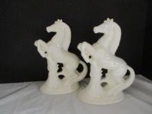 Pair of Vintage Milk Glazed Ceramic Riding Horse Sculptures