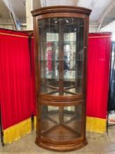 Vintage Pulaski Lighted Wooden Corner Curio Cabinet w/ Curved Front, 5 Shelves & Mirror Back. See