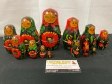Pair of Vintage Russian USSR Matryoshka Nesting Dolls, 7 & 6 piece sets, Red & Green