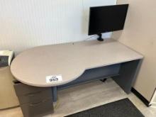 Formica top desk w/ monitor.