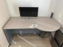 Formica top desk w/ monitor.