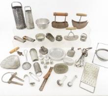 Collection of vintage metal kitchen utensils