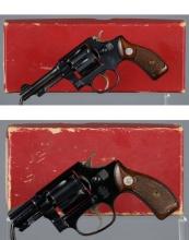 Two Smith & Wesson Double Action Revolvers with Red Boxes