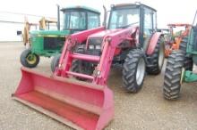MAHINDRA 7010 4WD C/A W/ LDR AND BUCKET 1405HRS. WE DO NOT GAURANTEE HOURS