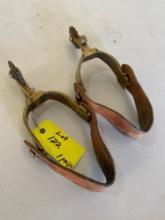 Spurs, brass with leather straps. 1 pair